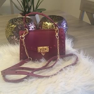 Small bag with star cram and removable straps